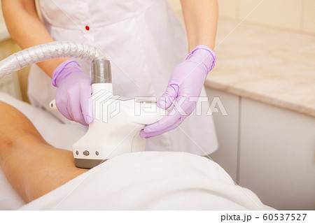 Body Care. Woman is in the process at the clinic lipomassage Body Care. Woman is in the process at the clinic lipomassage 60537527