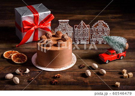 Christmas holiday table with delicious truffle cake Christmas holiday table with delicious truffle cake 60546479