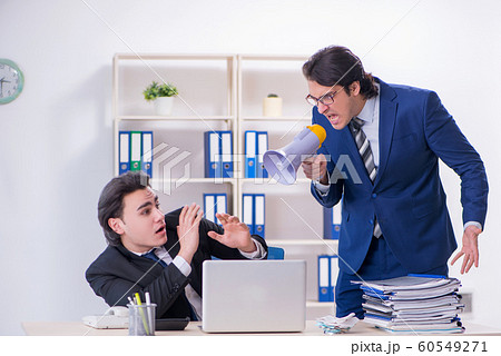 Boss and his male assistant working in the office 60549271