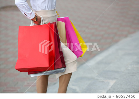 Pretty lady with hands on belt Pretty lady with hands on belt 60557450