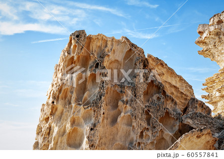 Cliffs by the sea. 60557841