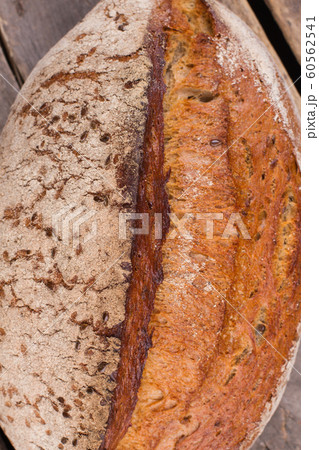 Homemade loaf of wheat bread. 60562541