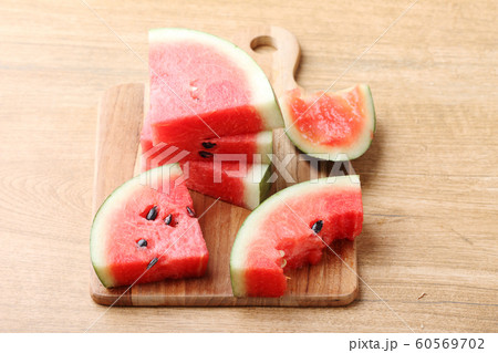 fresh watermelon on wooden background fresh watermelon on wooden background 60569702
