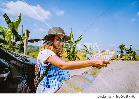 woman travel relaxing nature mountain map woman travel relaxing nature mountain map 60569746