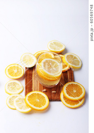 drink and stack of citrus fruits slices. drink and stack of citrus fruits slices. 60569748
