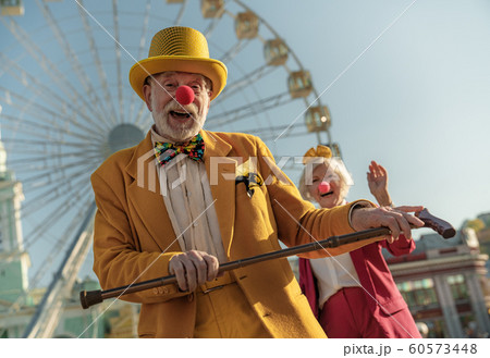 Mature clowns having fun in amusement park stock photo 60573448