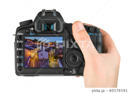 Hand with camera and Town Obidos - Portugal (my Hand with camera and Town Obidos - Portugal (my 60576591