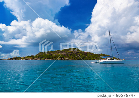 Tropical island at Seychelles and boats Tropical island at Seychelles and boats 60576747