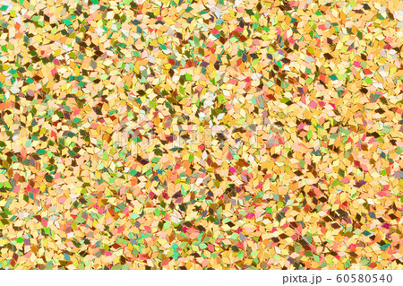 Holographic glitter background, shiny yellow texture for your attractive Christmas design. Holographic glitter background, shiny yellow texture for your attractive Christmas design. 60580540