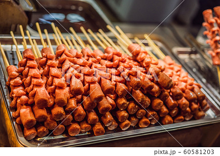 Grilled sausages, street food Wangfujin night market Grilled sausages, street food Wangfujin night market 60581203