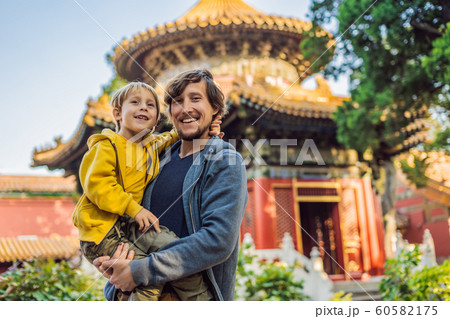 Enjoying vacation in China. Dad and son in Forbidden City. Travel to China with kids concept. Visa free transit 72 hours, 144 hours in China 60582175