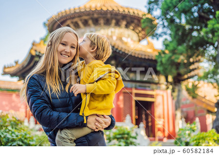 Enjoying vacation in China. Mom and son in Forbidden City. Travel to China with kids concept. Visa free transit 72 hours, 144 hours in China 60582184