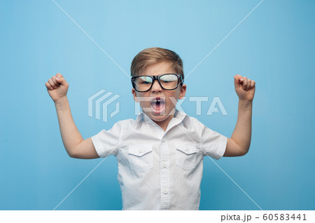 Cute Little Emotional Caucasian Boy Shouting Cute Little Emotional Caucasian Boy Shouting 60583441