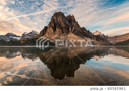 Rocky mountain reflection on Cerulean lake in 60585961