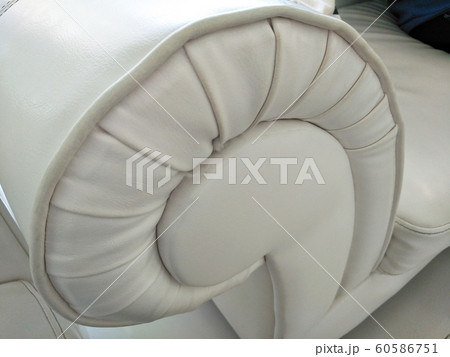 White sofa cushion edge, rounded appearance, background image 60586751