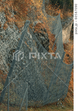 Protective metal mesh against falling stones in 60587090