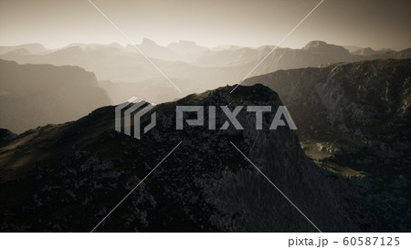 Dramatic sky over steps in a mountain. Dramatic sky over steps in a mountain. 60587125