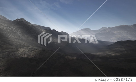 Sun Rays over Mountains in a Valley 60587175