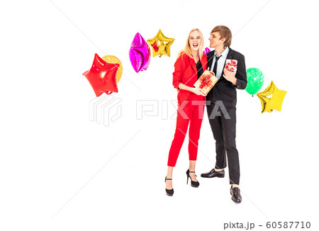 young happiness couple enjoy posing with colorful ballons in new year celebration party 60587710
