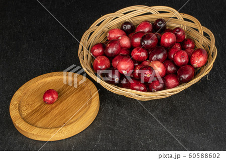 Fresh red cranberry on grey stone 60588602