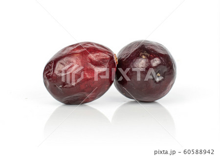 Fresh red cranberry isolated on white Fresh red cranberry isolated on white 60588942