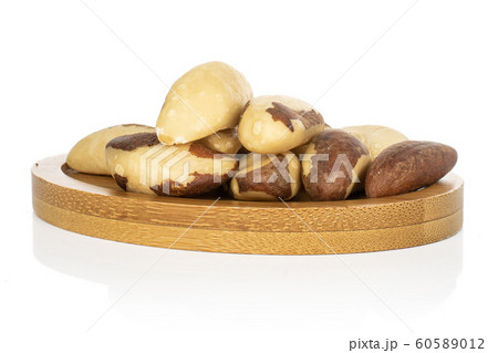 Brown brazil nut isolated on white Brown brazil nut isolated on white 60589012