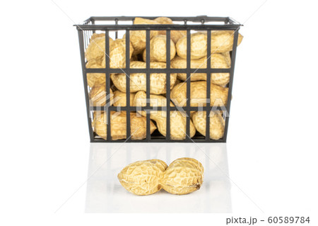 Tasty beige peanut isolated on white Tasty beige peanut isolated on white 60589784