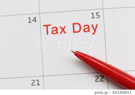 Red pen point to a empty space on the calendar. Red pen point to a empty space on the calendar. 60590651