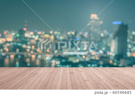Wood floor terrace or wooden table with blur background rooftop perspective view city night light bokeh 60590685