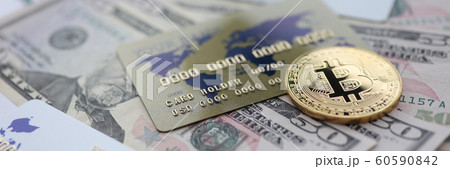 Gold coin bitcoin closeup lie on table 60590842