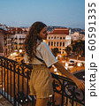 Beautiful caucasian woman smiling. On the streets of old town in Cannes, France. 60591335