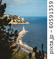 Port of Nice view through the cactuses. Lighthouse in the south coast of France. Azur sea 60591359
