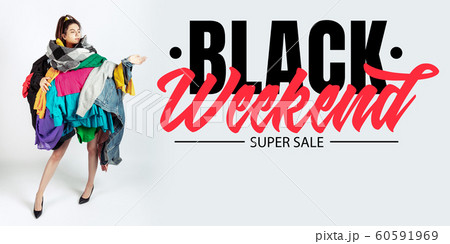 Woman addicted of sales and clothes, black weekend, sales concept Woman addicted of sales and clothes, black weekend, sales concept 60591969