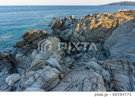 Sea and the grey stones in Greece 60594773