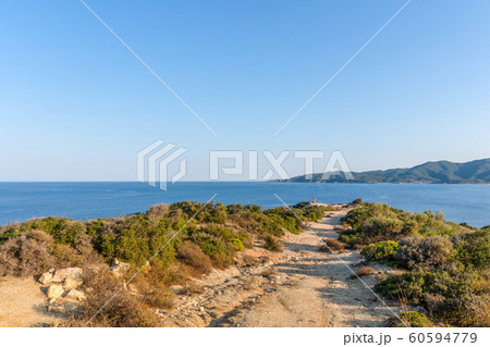 Sandy road to the sea in Greece Sandy road to the sea in Greece 60594779