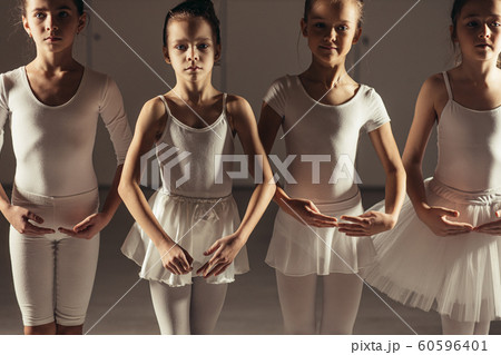 Choreographic dance ballet of pretty caucasian children in studio Choreographic dance ballet of pretty caucasian children in studio 60596401