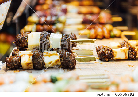 A wide variety of traditional tapas with seafood in Spain at the San Miguel market A wide variety of traditional tapas with seafood in Spain at the San Miguel market 60596592