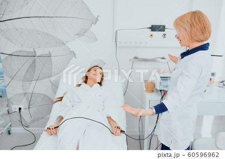 woman lying on bed in hospital woman lying on bed in hospital 60596962