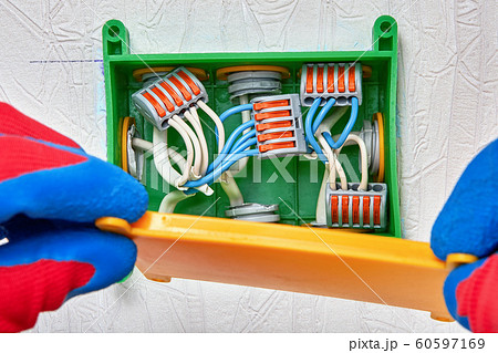 Splicing electrical wires with a clamp terminal. 60597169