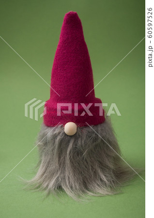 Closeup of christmas gnome on green background Closeup of christmas gnome on green background 60597526