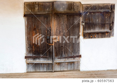 Old antique grunge wooden door for barn 60597563
