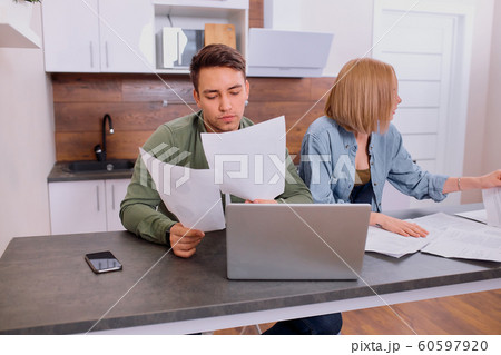 online searching of bills and expenses on mortgage using laptop online searching of bills and expenses on mortgage using laptop 60597920