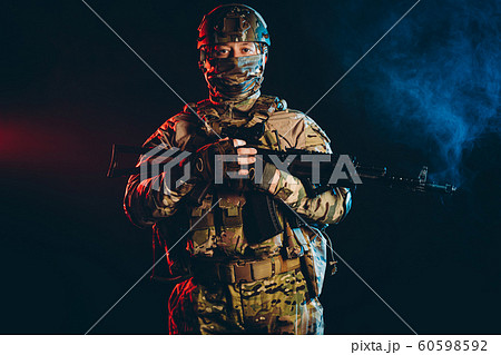 military man with gun military man with gun 60598592