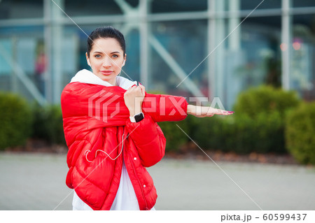 Woman Stretching Body, Doing Exercises On Street 60599437