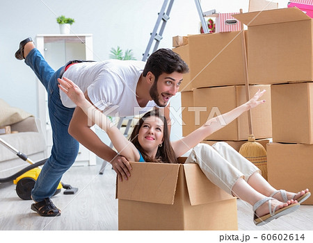 Young family moving to new apartment Young family moving to new apartment 60602614
