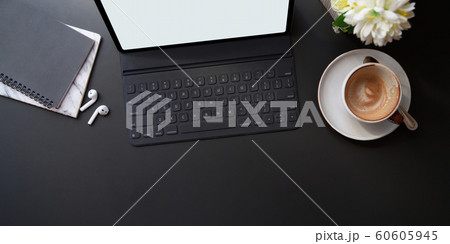 Top view of stylish workplace with digital tablet Top view of stylish workplace with digital tablet 60605945