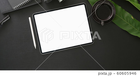 Top view of dark modern workplace with blank Top view of dark modern workplace with blank 60605946
