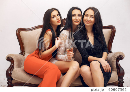 Elegant girls celebrate in the studio 60607562