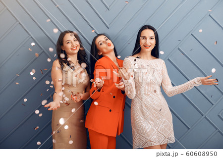 Elegant girls celebrate in the studio Elegant girls celebrate in the studio 60608950