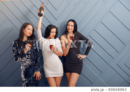 Elegant girls celebrate in the studio Elegant girls celebrate in the studio 60608963